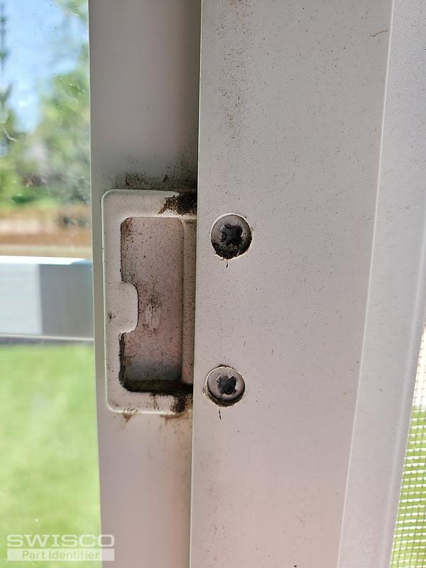 Window latch plate installed