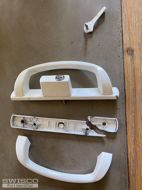 Broken door handle part from sliding glass door