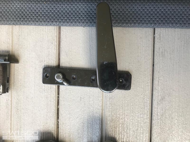 Storm door handle on glass sunroom door