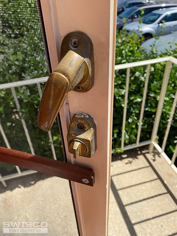 Storm door handle/latch
