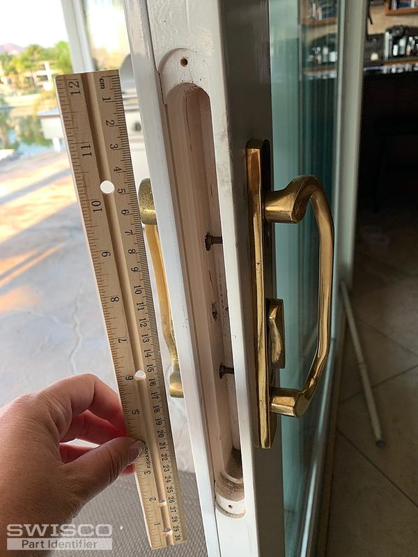 Sliding glass door handles, double latching mechanism