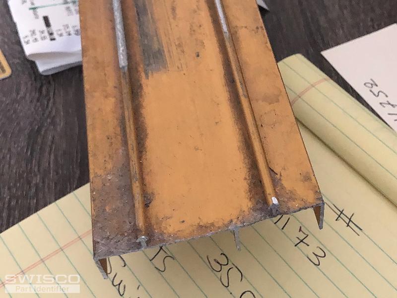 Bottom track for mirrored closet doors.