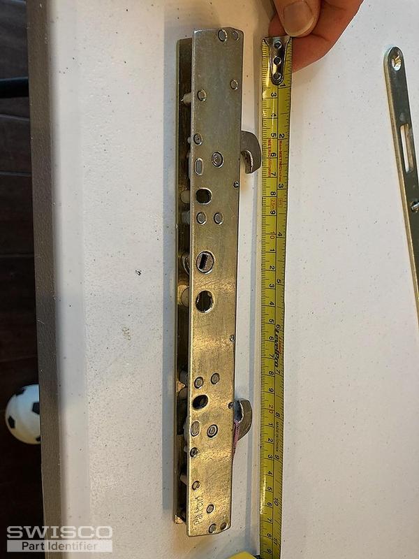 Sliding patio door latching mechanism