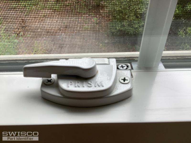 Weather stripping for a prism double hung window