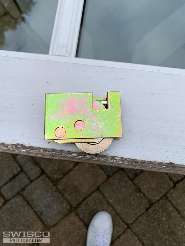 How do I replace my Pella door roller parts?