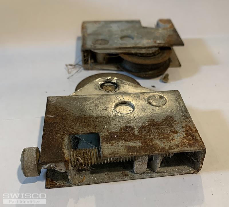 How do I replace my Pella door roller parts?