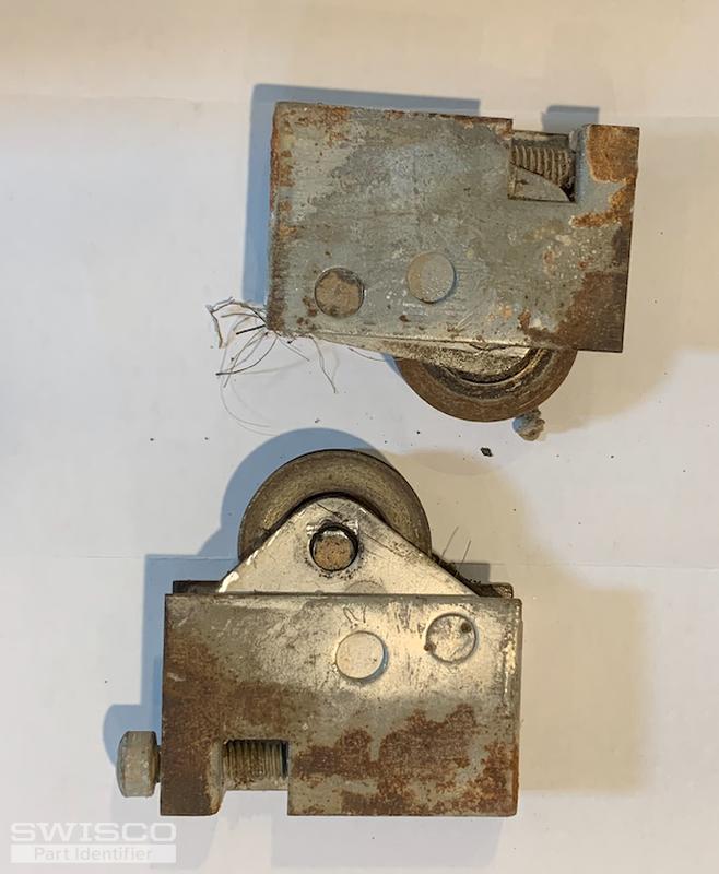 How do I replace my Pella door roller parts?