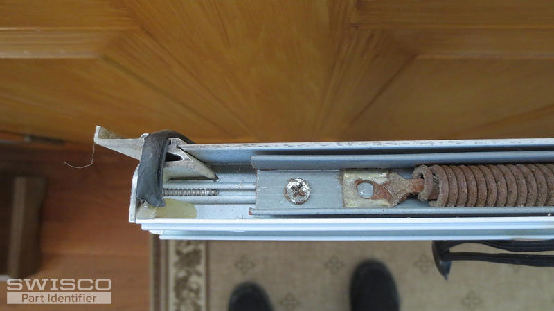 screw at top of sash