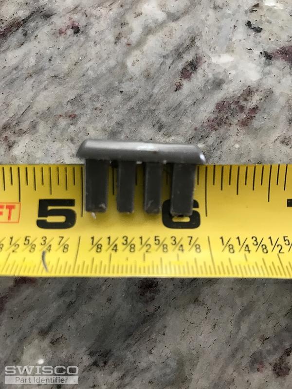 Plastic clip for tub shower door at the bottom