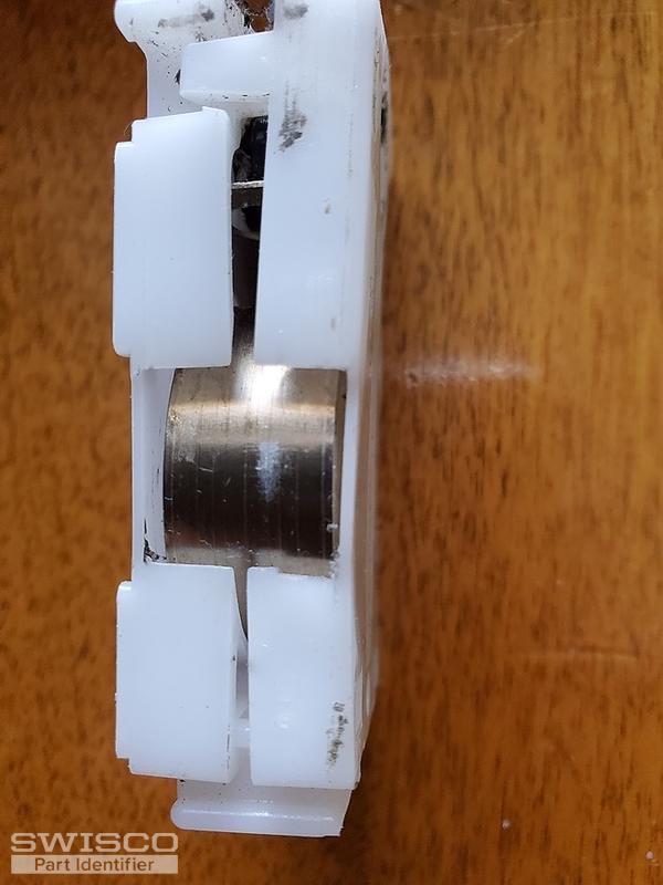 Window sash coil spring