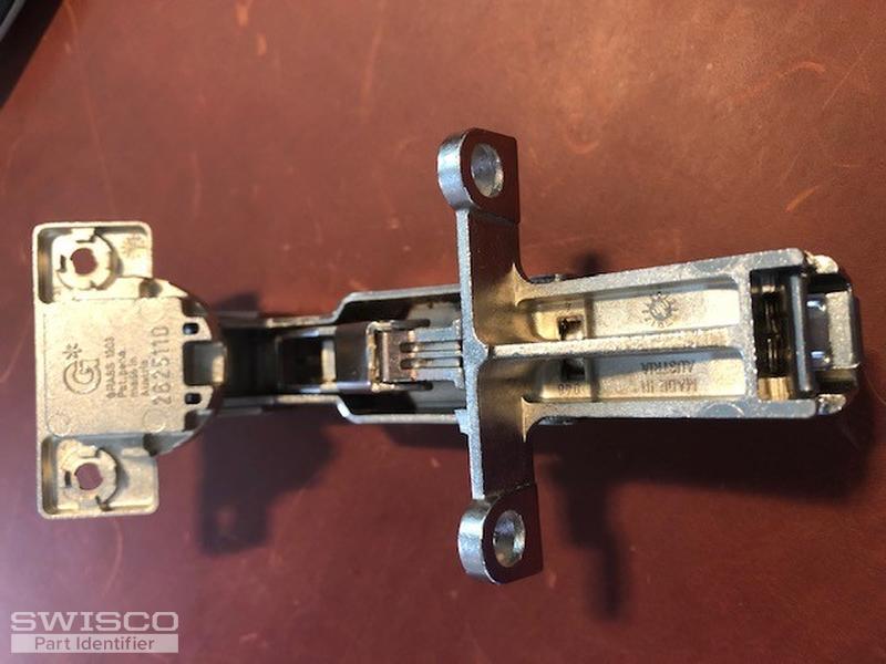 Replacement hinge for lazy susan door