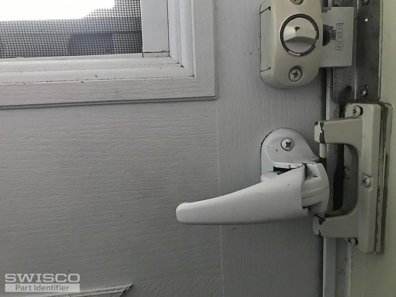 broken storm door inside latch