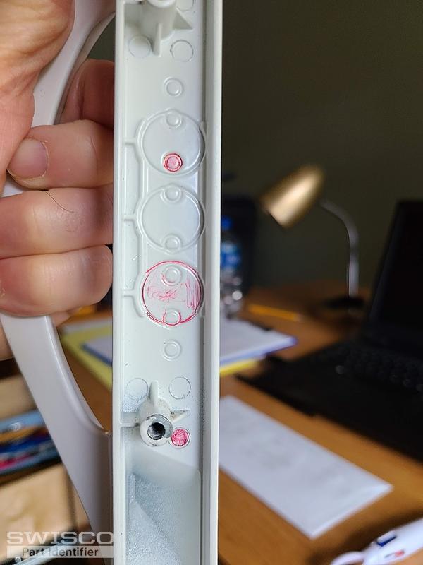 holes to punch out on outer door handle