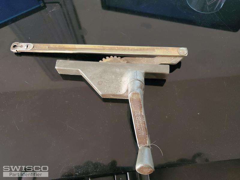 Crank for awning windows and window latch.