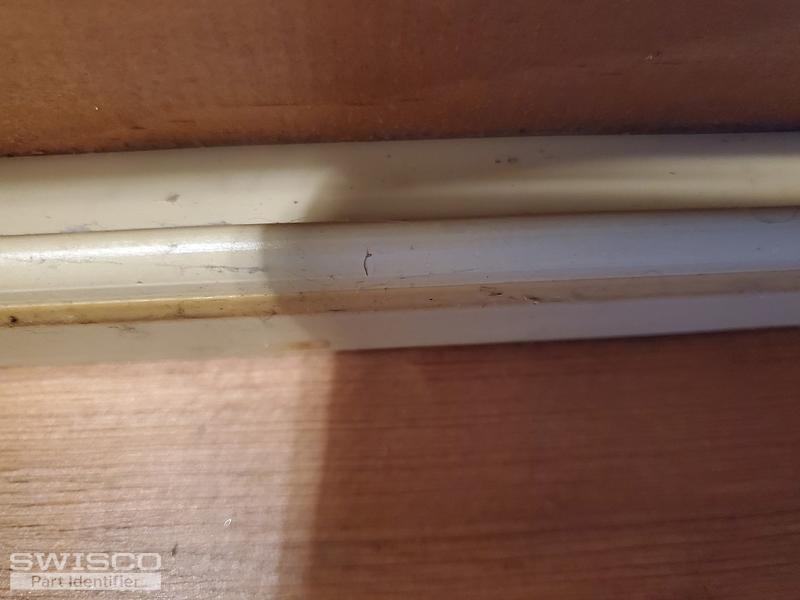 existing weather strip - thin piece of plastic lig