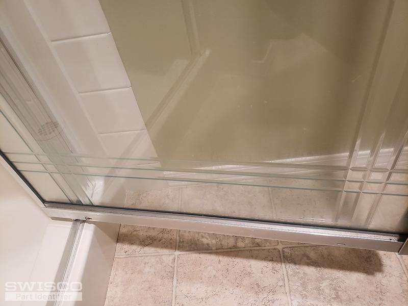 Framed shower door bottom seal/ drip rail.