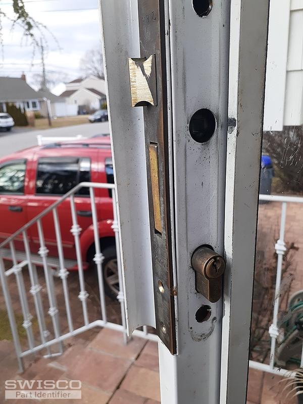 Storm door lock removal