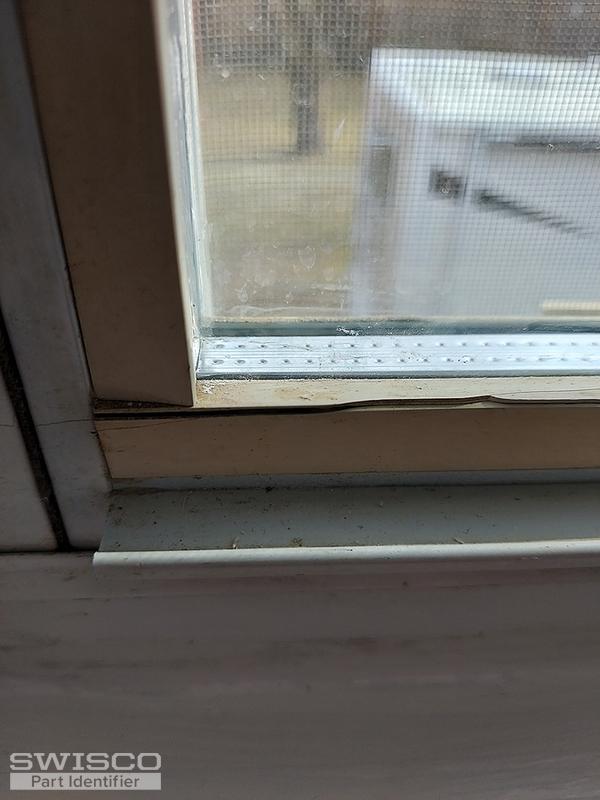 Plastic strip around window glass