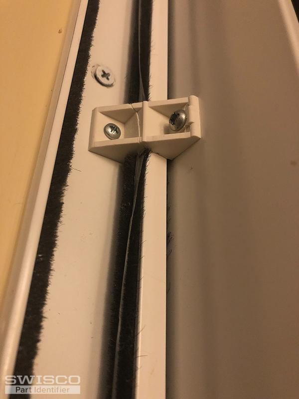 Brackets that attach sliding door to house