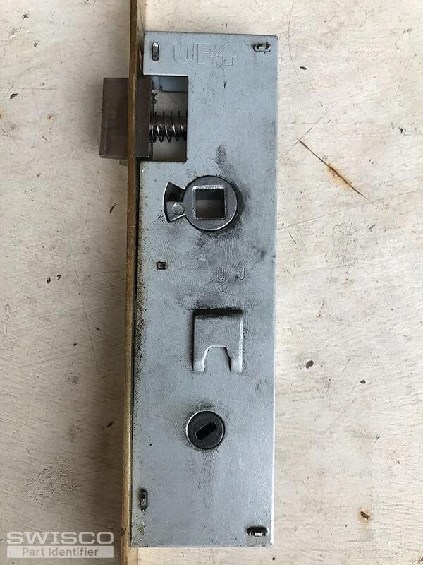 Storm door latch assembly