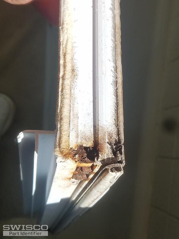 Botton of sash with part rusted away