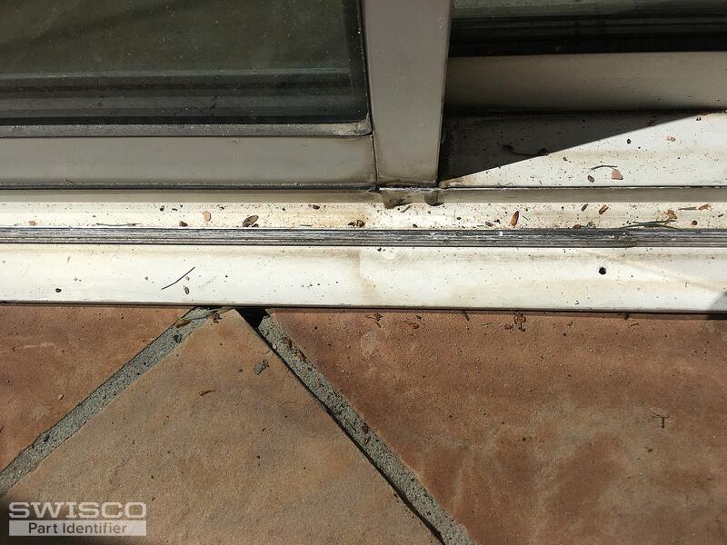 Bottom track for screen door