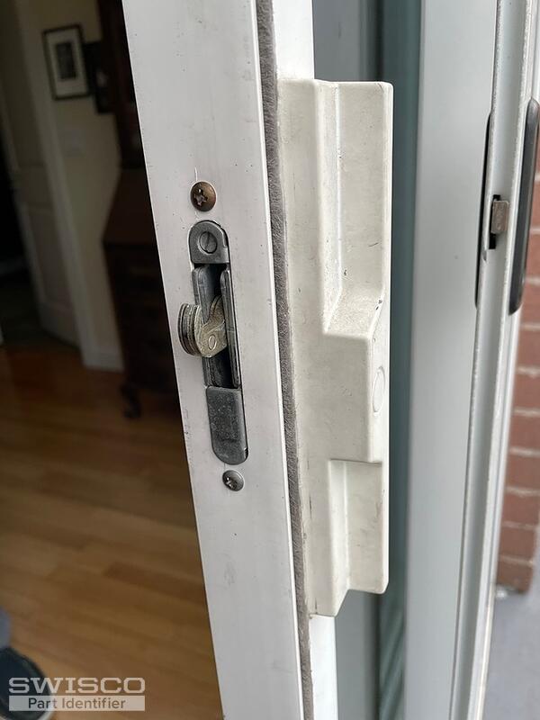 sliding door lock mechanism with lock extended