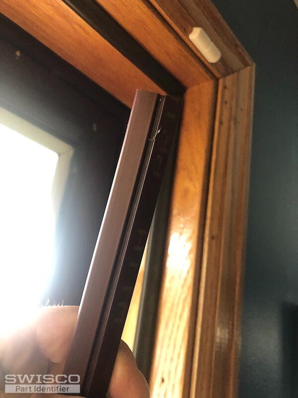 Glass retainer interior glazing strips for storm door