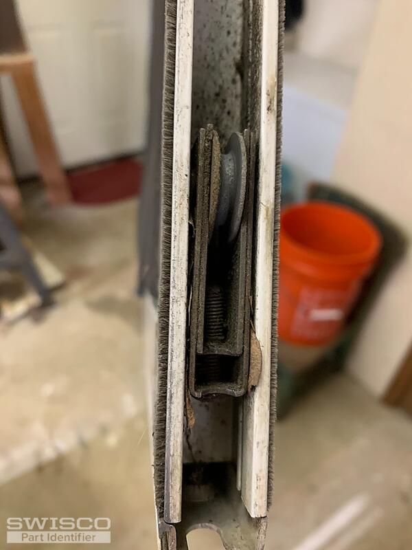 Replacing screen door rollers on a Patio Enclosure Unit