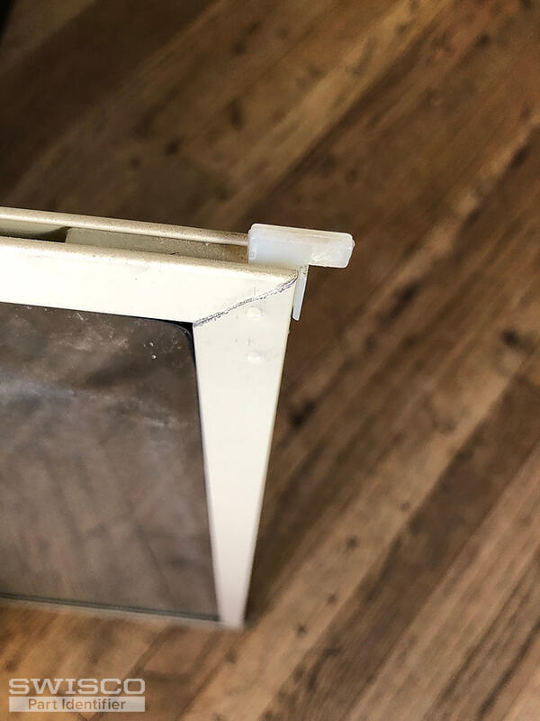 Corner tilt key for Kaufmann storm window