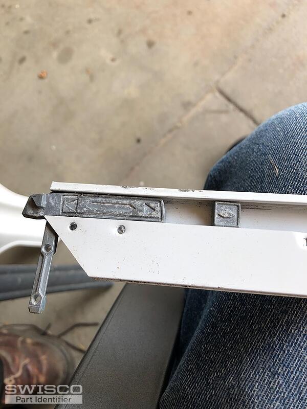 Storm door window latches