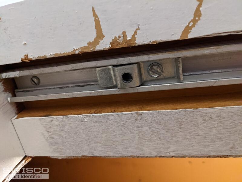 Top pivot bracket for bifold door