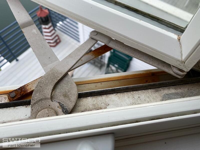Picture of rusted support for right side of widow.
