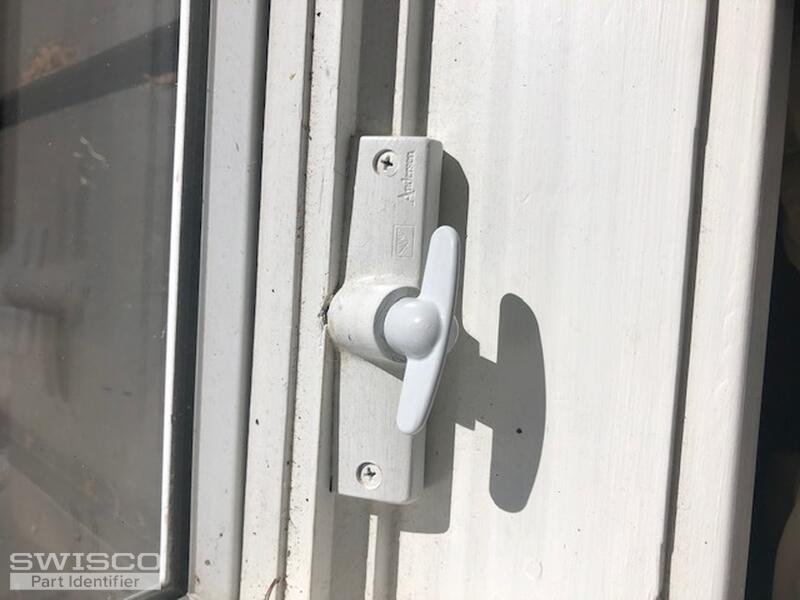 T Handle on 1983 anderson window