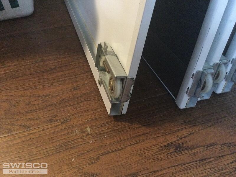 Mirrored sliding closet door rollers and guides