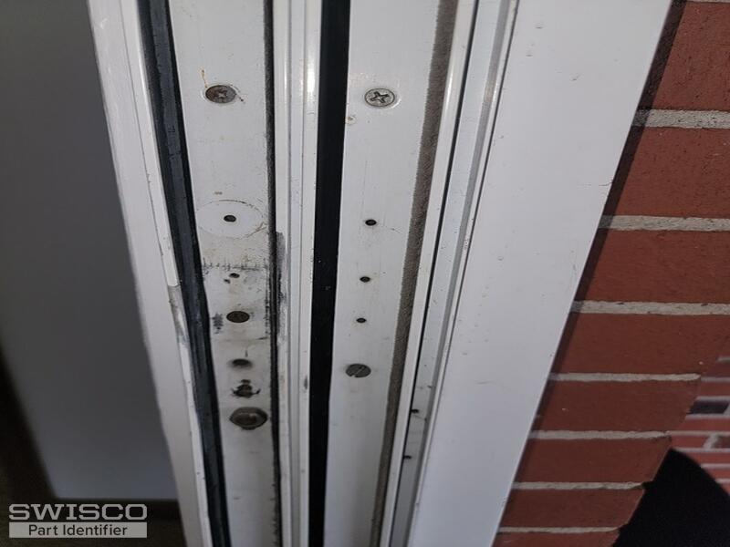 Sliding glass door latch catch