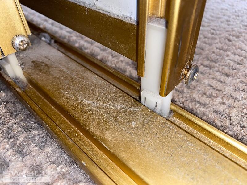 Bottom track guide for bypass doors