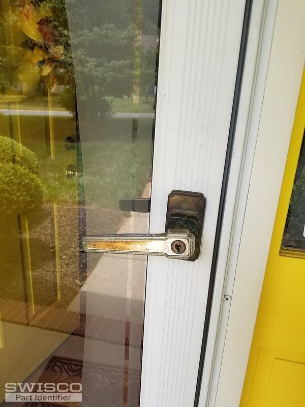 Need to replace storm door handle lock with key 17656