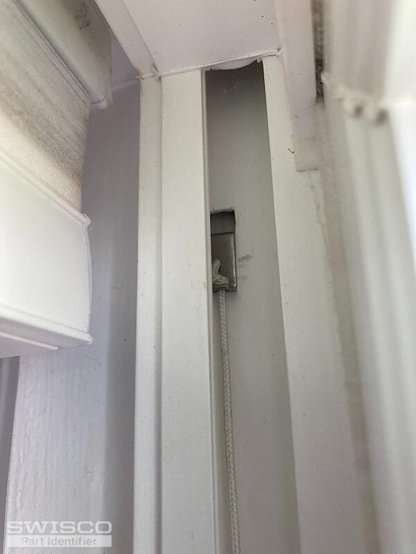 Pella window sash balance clip in side of frame