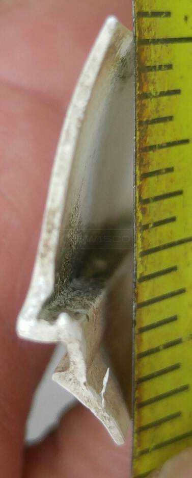 Bent glazing bead that needs to be replaced.