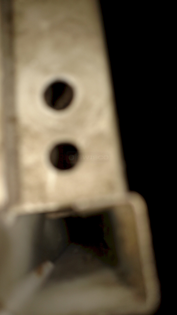 Photo of the location of the guide holes for a closet door.