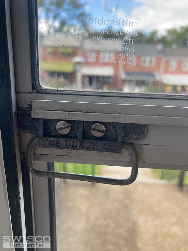 Storm window Latch for a storm door