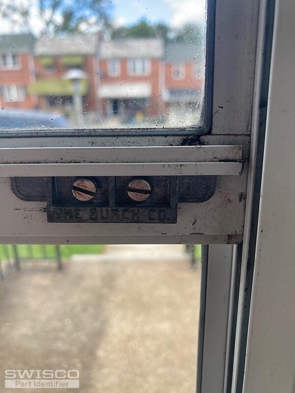 Storm window Latch for a storm door