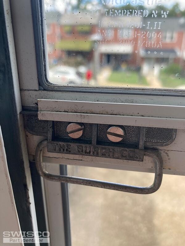 Storm window Latch for a storm door