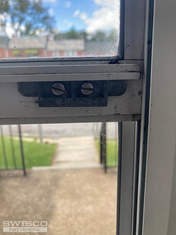 Storm window Latch for a storm door