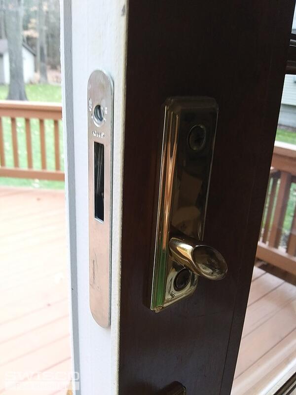 sliding door thumb latch in brass color