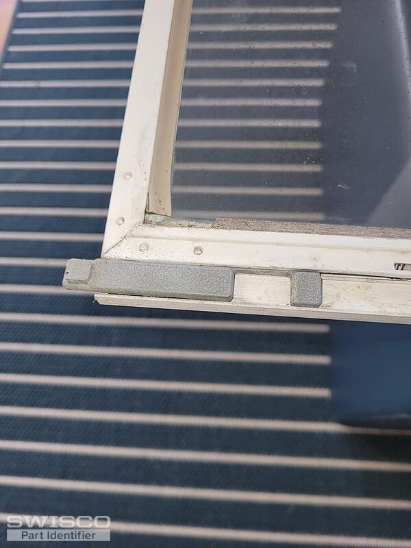 Storm window latch