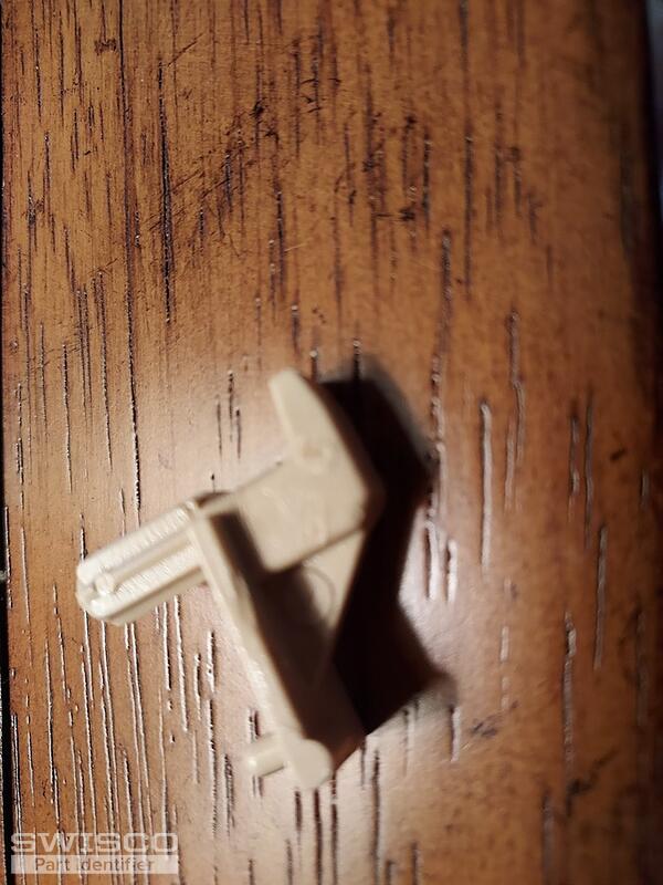 Plastic drawer guides.