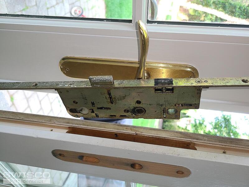 Pella storm door mechanism