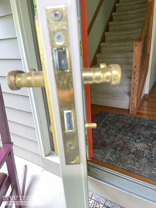 Emco storm door latch assembly